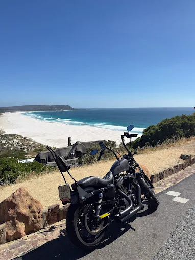 West Coast Motorcycles riders at a scenic Western Cape viewpoint